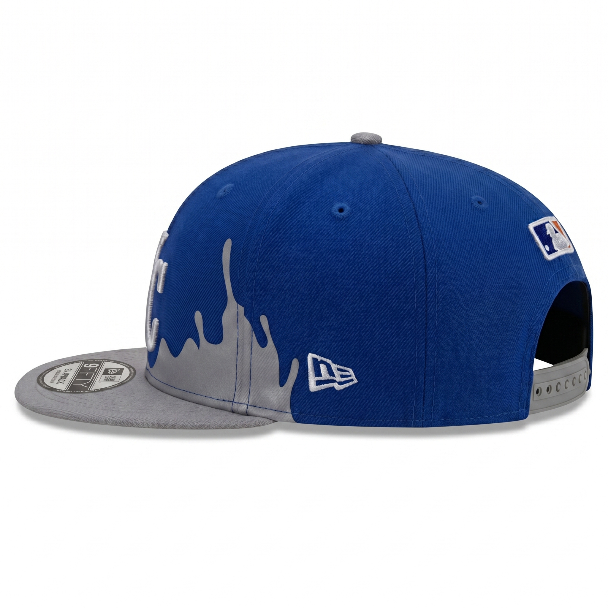 Rear view of the New Era Kansas City Royals 9FIFTY Snapback Cap with grey adjustable closure. Showcases blue and grey drip pattern, MLB Batterman logo, and New Era flag logo