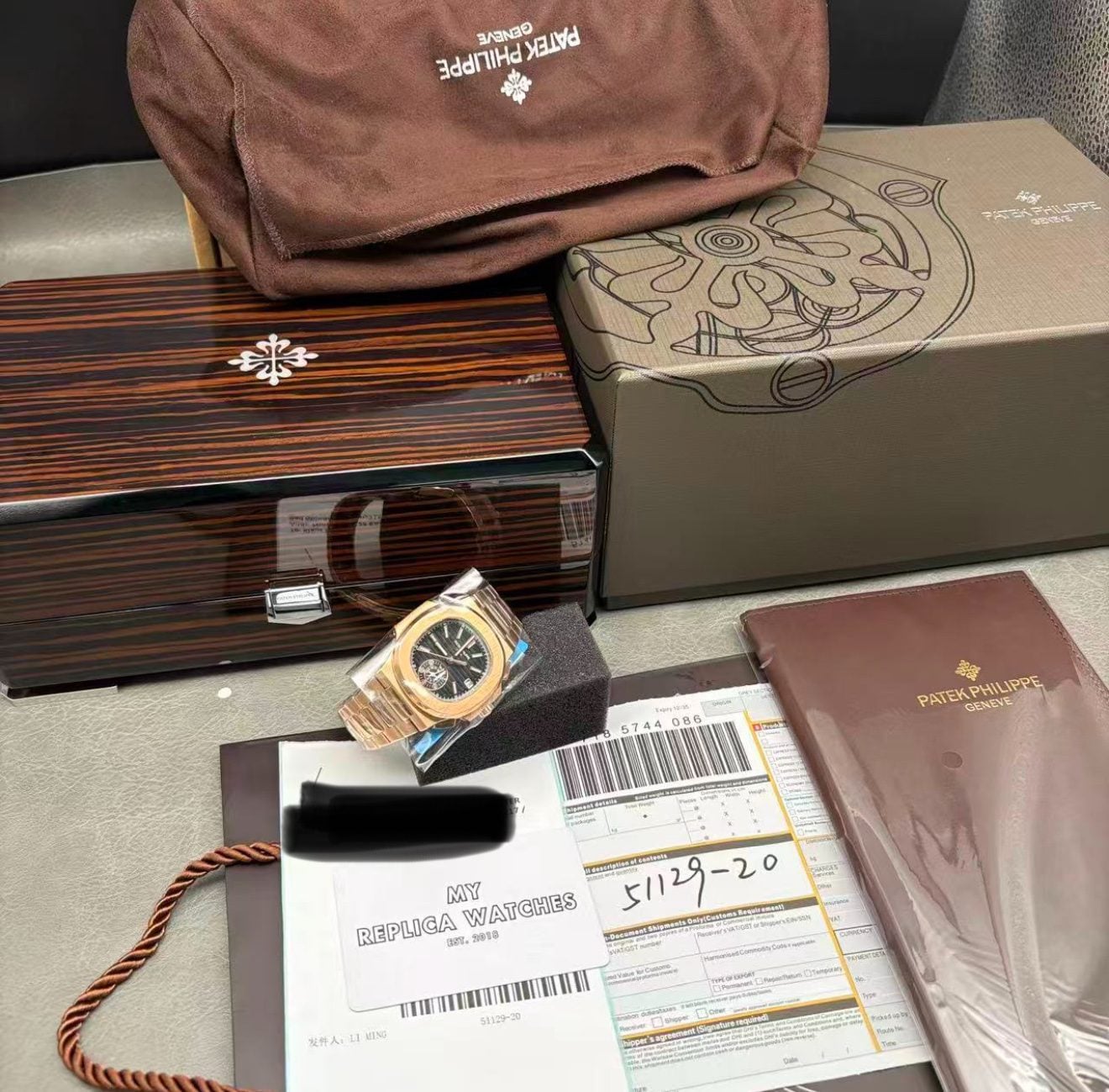 Replica Patek Philippe 5980 – Nautilus Rose Gold