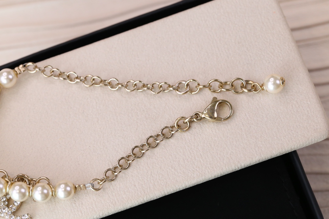 Chanel Bird CC Charms Chain Pearl Tassel Bracelet - Original Replica Club