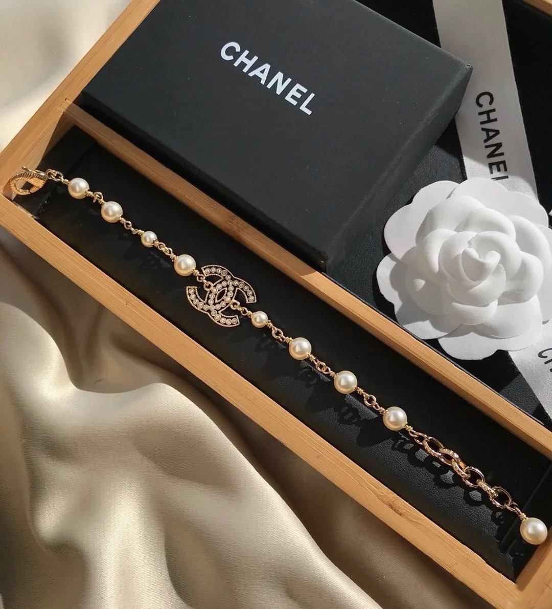 Chanel Hollow CC Diamond Paved Pearl Chain Bracelet - Original Replica Club