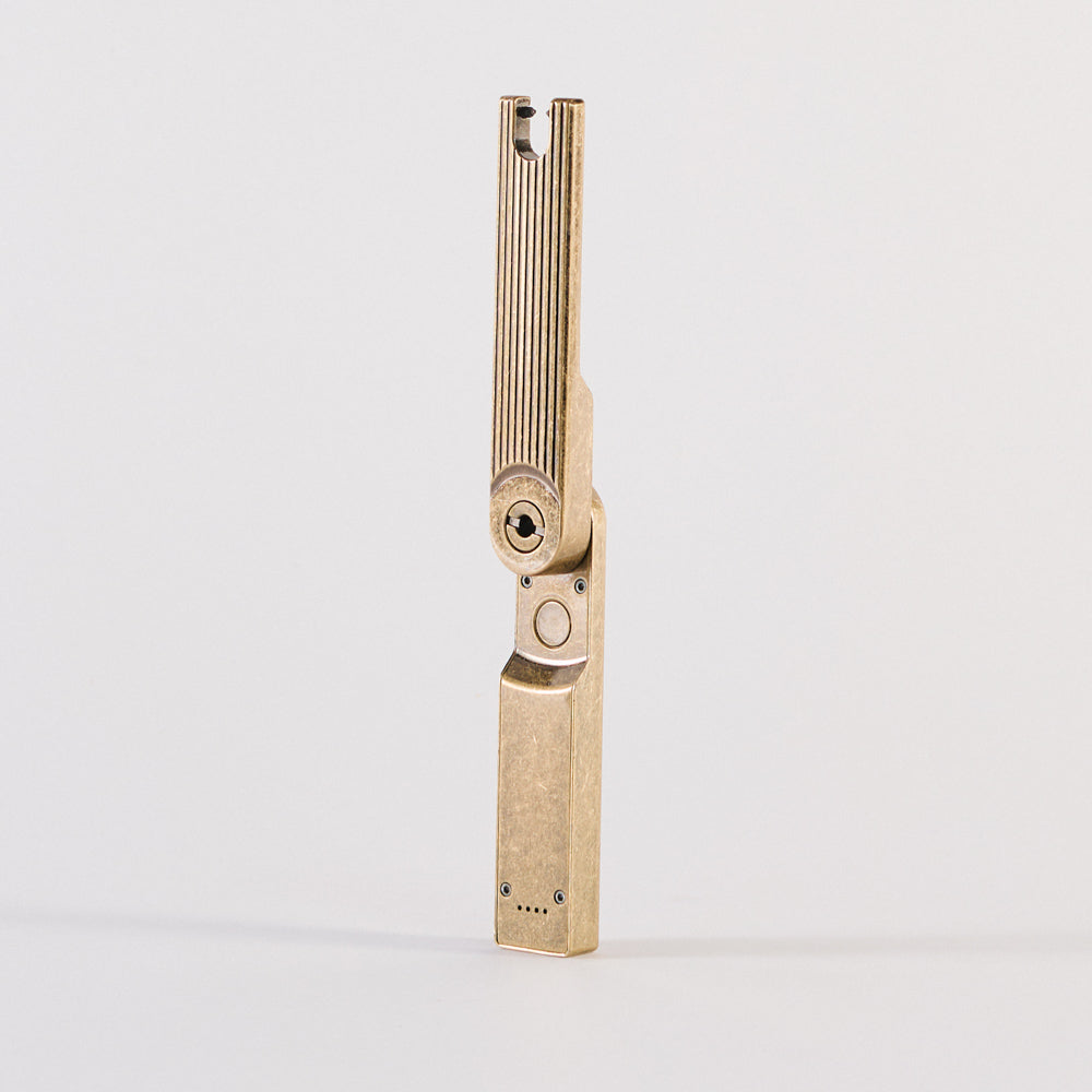 Briquet à arc pivotant