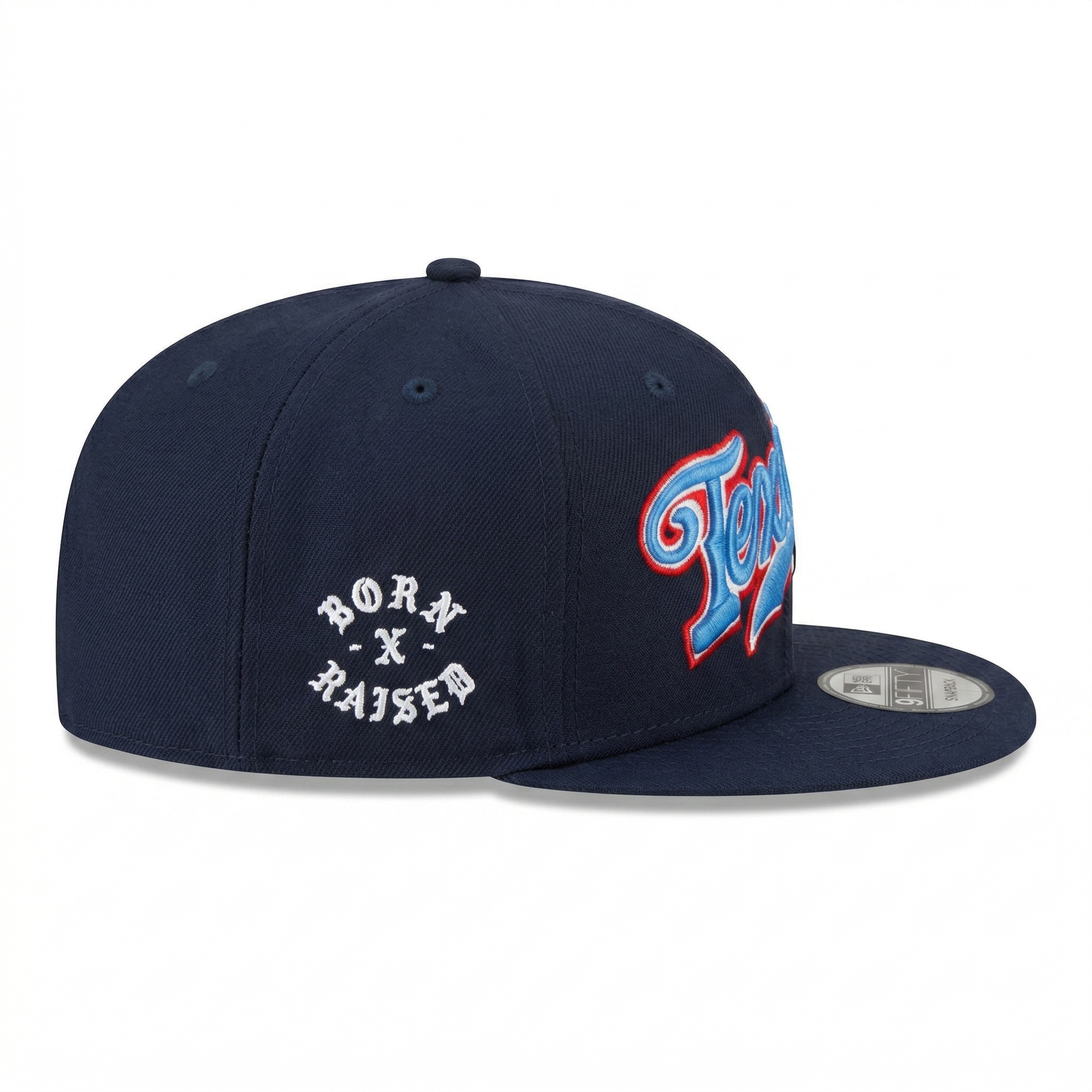Side profile of a navy blue Houston Texans flat brim cap featuring custom white gothic side embroidery, curated by SEVEN HATS