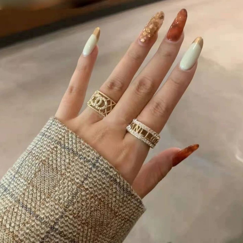 Chanel Light Gold Hollow Pearl CC Ring - Original Replica Club