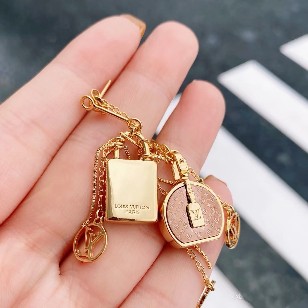 Louis Vuitton Asymmetric Lock and Handbag Tassel Earrings - Original Replica Club