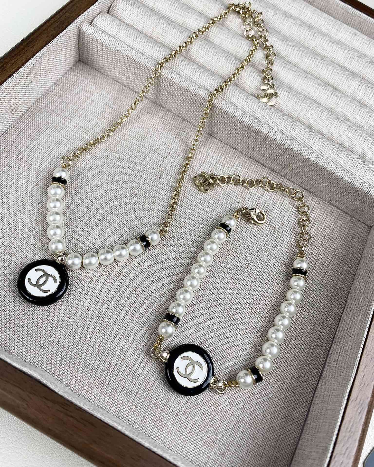 Chanel Black and White Round Charm Pearl Bracelet Necklace - Original Replica Club