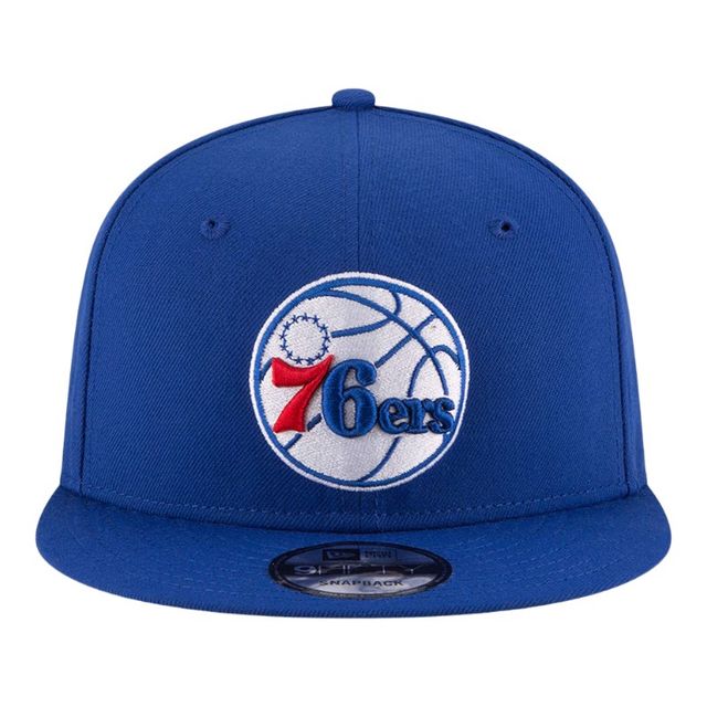 Front view of the New Era Philadelphia 76ers Royal 9FIFTY Snapback Hat featuring the classic embroidered 76ers basketball logo on the crown.