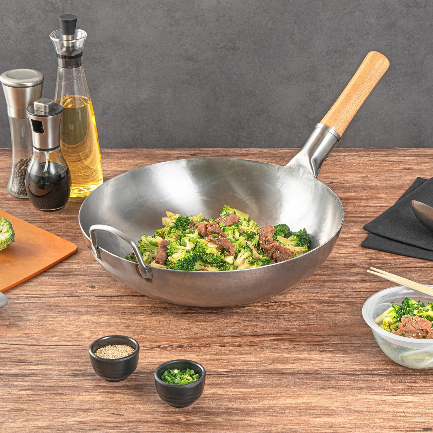 Restaurantware Carbon Steel Wok 1 Pack of 14 Inch Heavy-Duty Stir Fry Pan Silver Hand Hammered Wok Efficient Maneuvering Steel Helper Handle Uniform Heat Distribution Asian Cooking