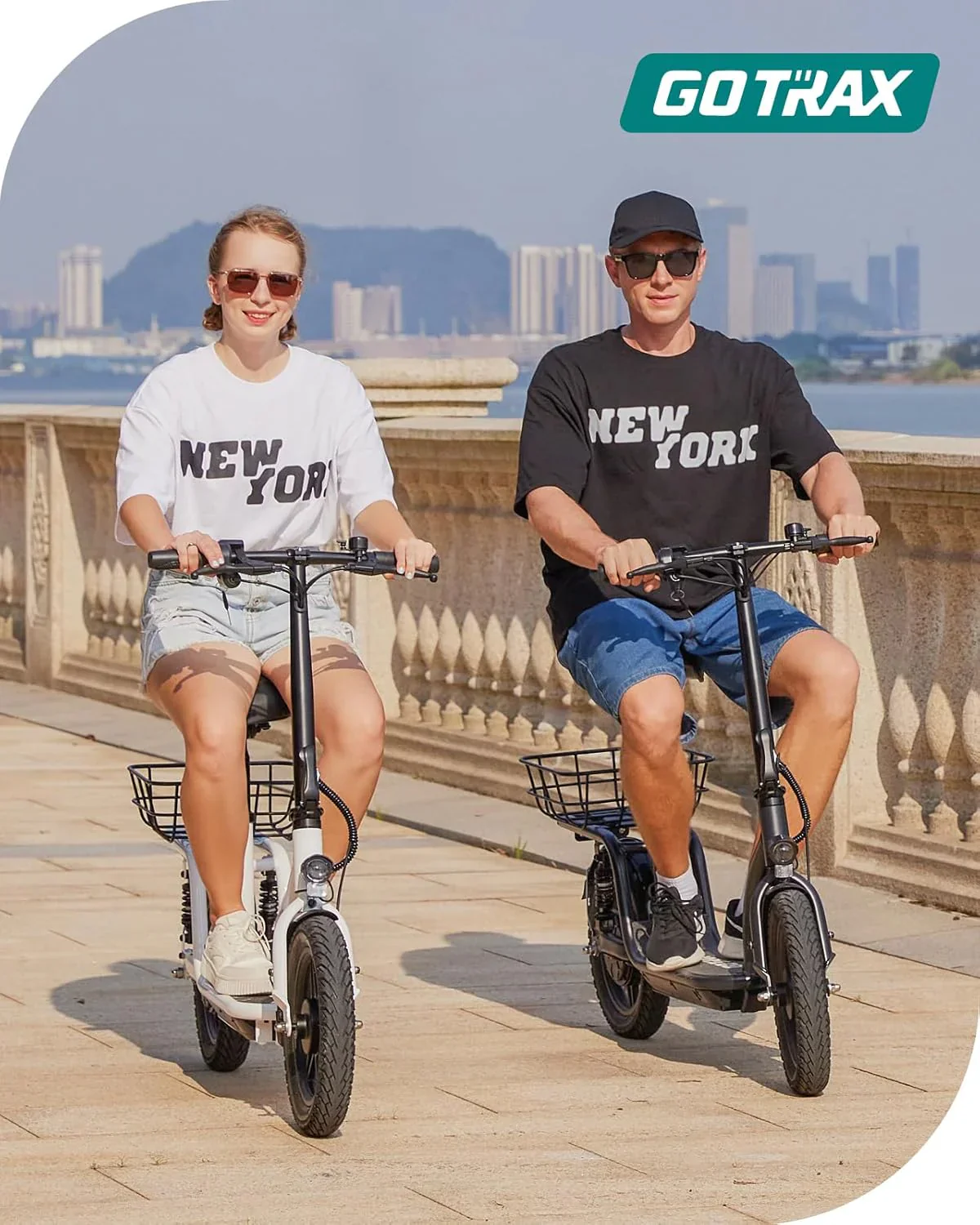Gotrax adult electric scooter with seat maximum range of 19-25 miles all-terrain tires wide pedals