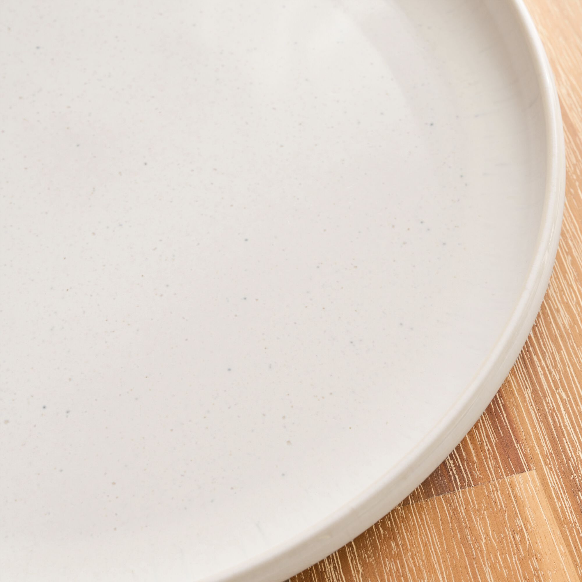 PITTA - Assiette plate en grès moucheté D26,5cm - blanc