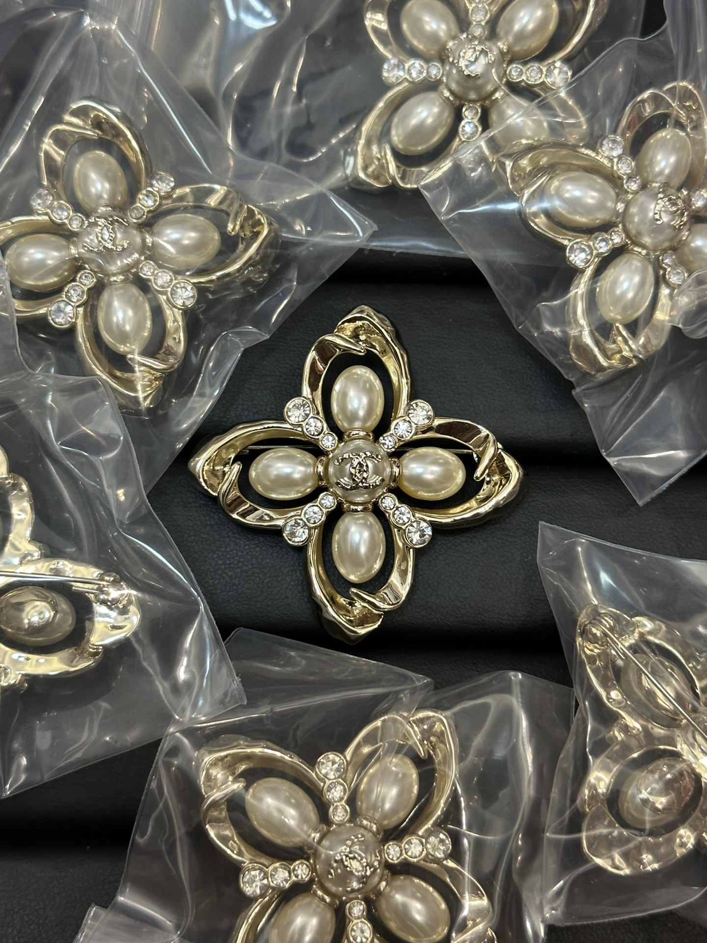 Chanel Rhombic Hollow Flower Rhinestone Pearl Brooch - Original Replica Club