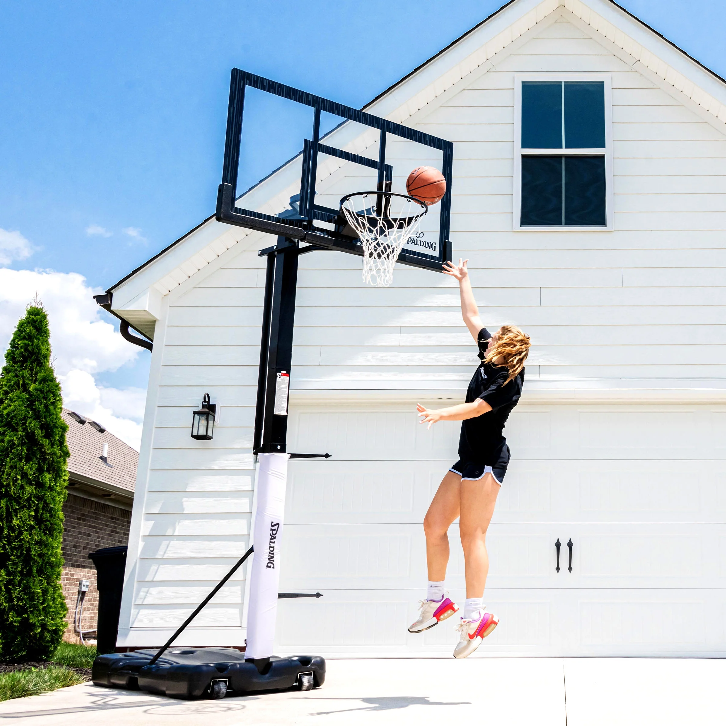 Spalding 60-Inch Portable Basketball Hoop with Acrylic Backboard, Screw Jack Lift & Arena Slam Rim-Outdoor Play - Image 13