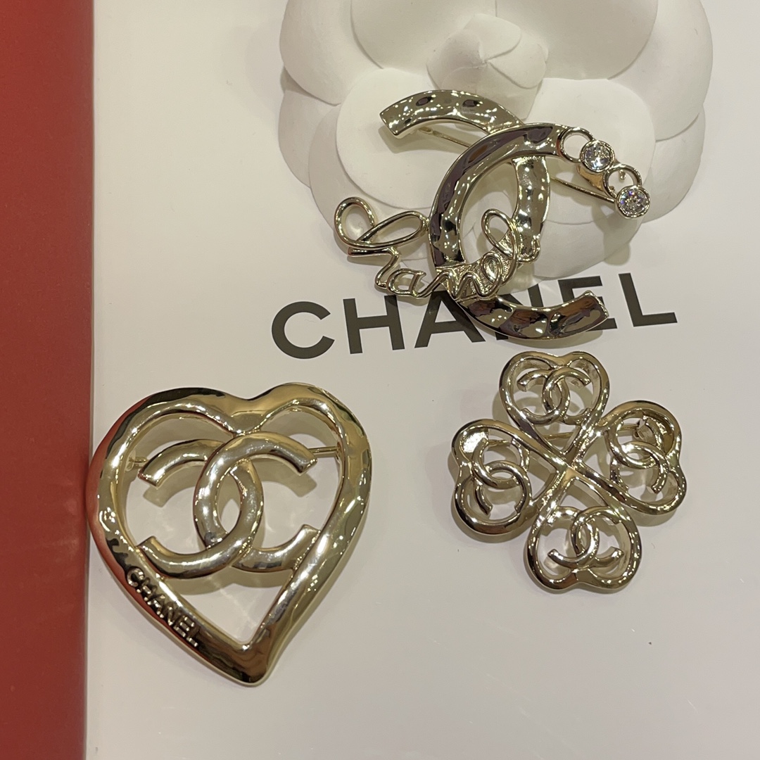 Chanel Light Gold Hollow Clover Brooch - Original Replica Club
