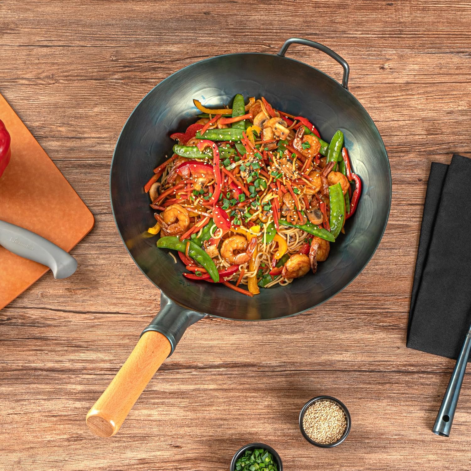 Restaurantware Carbon Steel Wok 1 Pack of 12 Inch Heavy-Duty Stir Fry Pan Blue Hand Hammered Wok Efficient Maneuvering Steel Helper Handle Uniform Heat Distribution Asian Cooking