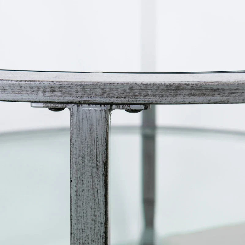 Glenn Distressed Silver Round Coffee Table with Glass Top and Shelf by SEI Furniture