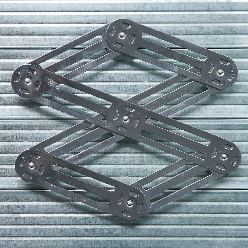 Dessous de plat extensible
