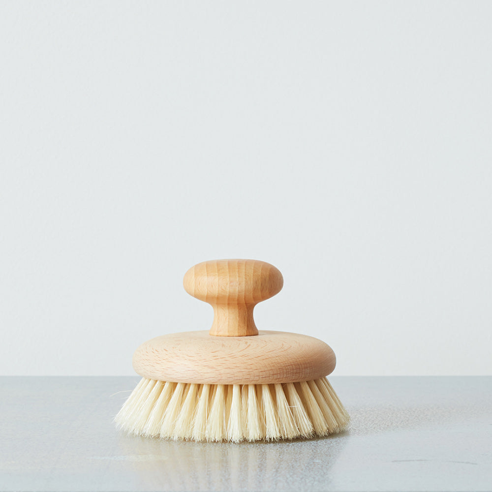 Brosse de massage avec pommeau