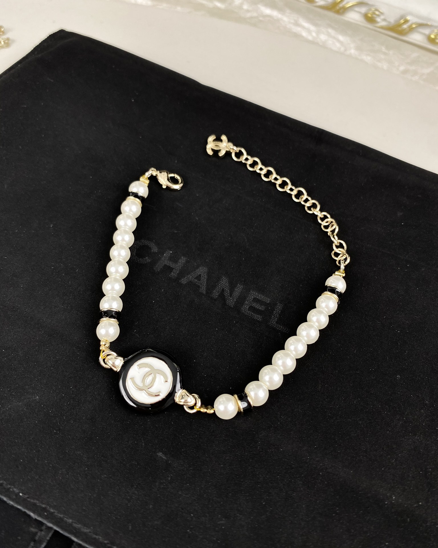 Chanel Black and White Round Charm Pearl Bracelet Necklace - Original Replica Club