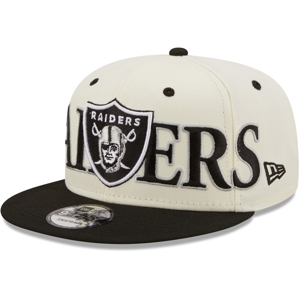 Angled front view of the New Era Las Vegas Raiders Two-Tone Chrome Classic 9FIFTY Snapback Hat featuring oversized wrap-around text and the classic shield logo.