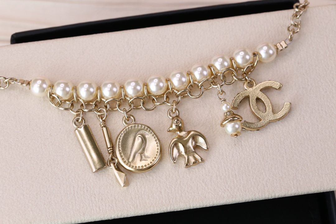 Chanel Bird CC Charms Chain Pearl Tassel Bracelet - Original Replica Club