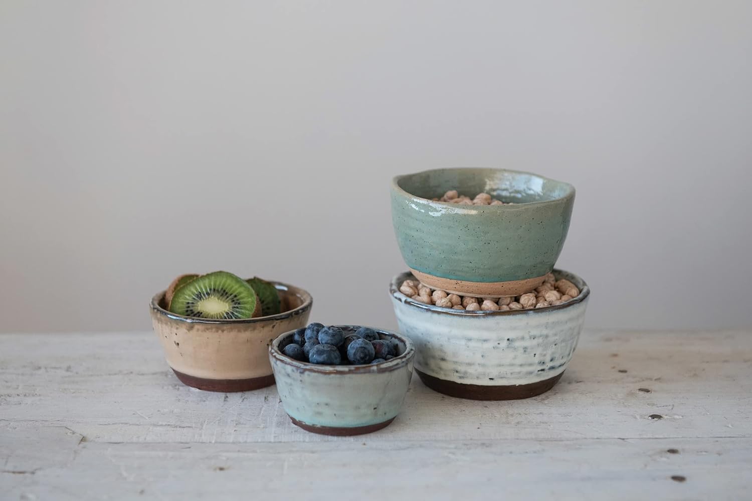 Creative Co-Op Stoneware Bowls with Reactive Glaze Finish, Set of 4
