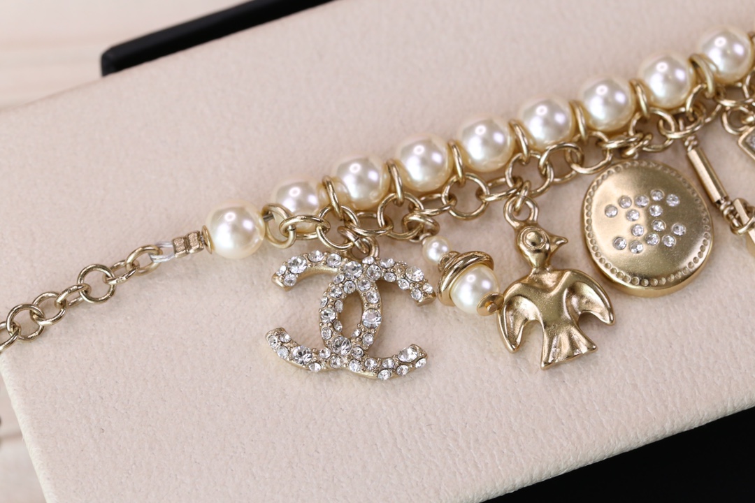Chanel Bird CC Charms Chain Pearl Tassel Bracelet - Original Replica Club
