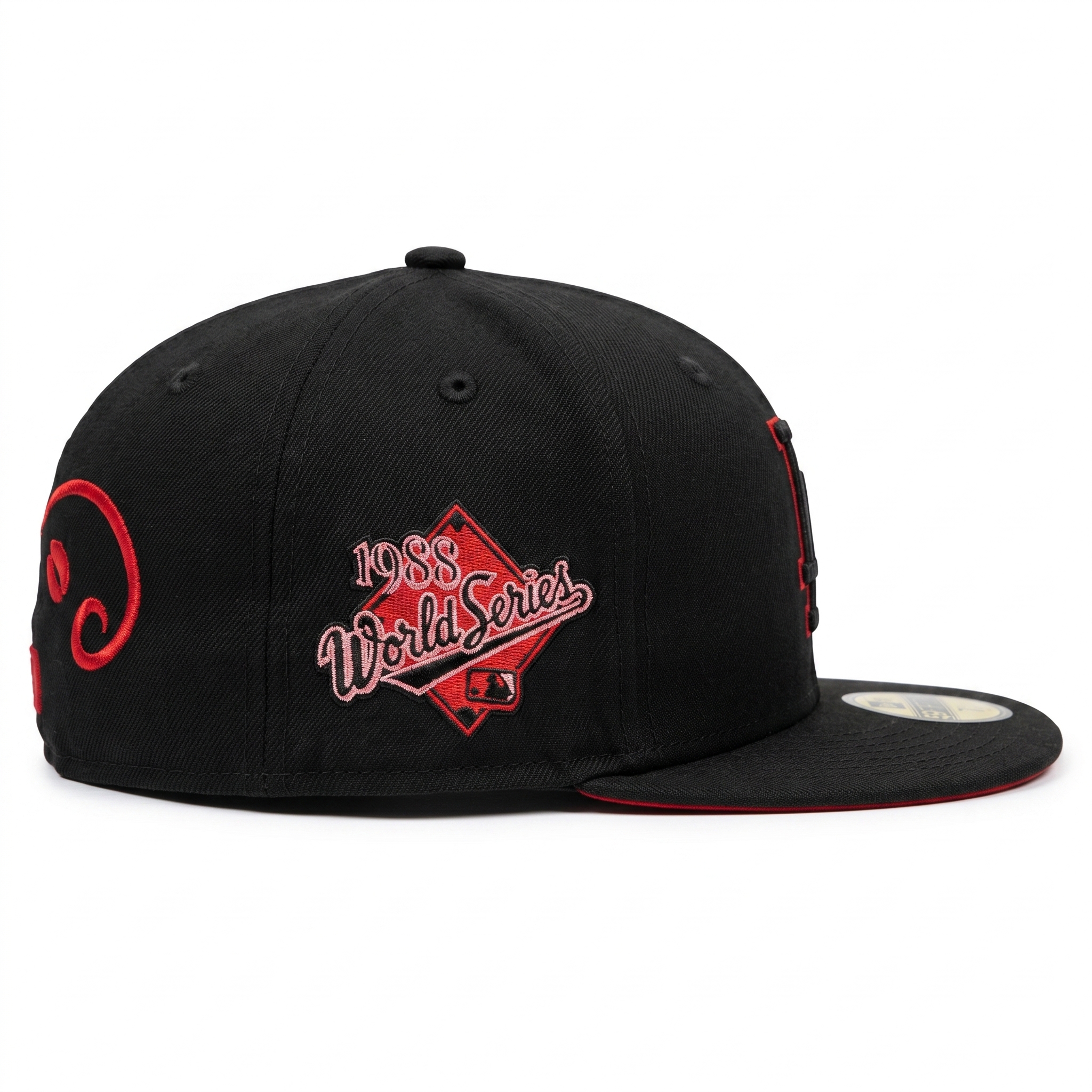 Black New Era fitted hat featuring a red 1988 World Series commemorative side patch.