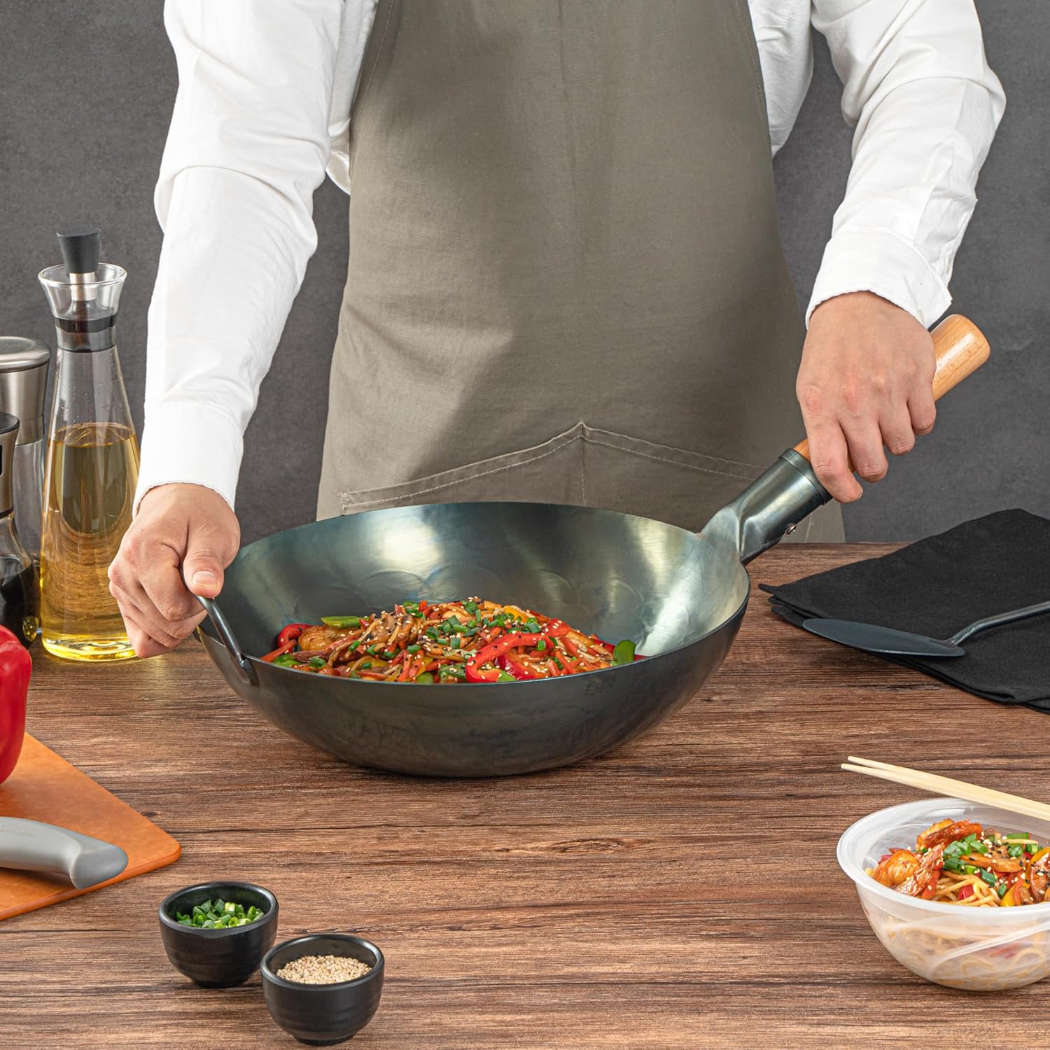 Restaurantware Carbon Steel Wok 1 Pack of 12 Inch Heavy-Duty Stir Fry Pan Blue Hand Hammered Wok Efficient Maneuvering Steel Helper Handle Uniform Heat Distribution Asian Cooking