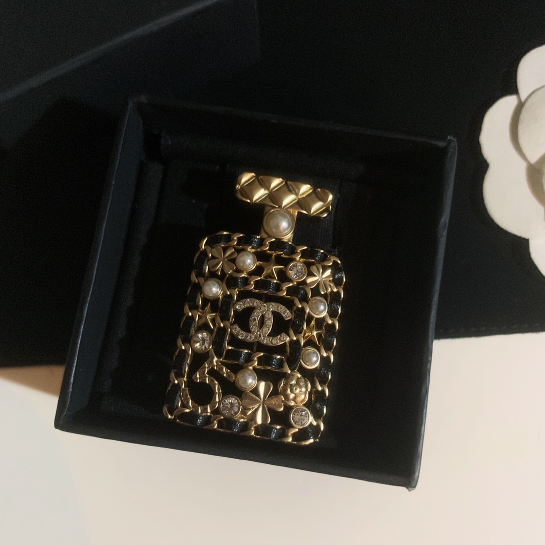 Chanel Leather Wrap Perfume Bottle Brooch - Original Replica Club