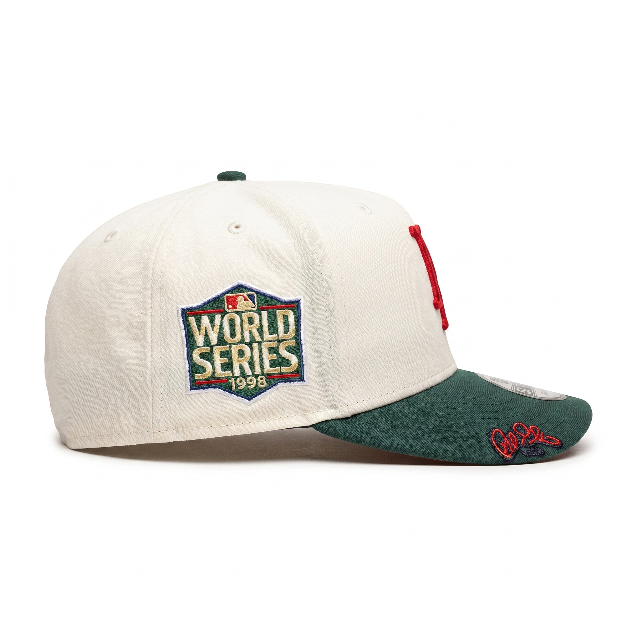 Right profile view of the off-white and green New Era LA Dodgers snapback hat, highlighting a commemorative World Series 1998 side patch and custom red script embroidery on the green visor