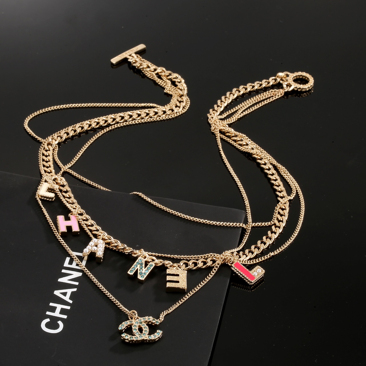 Chanel Multi Layered Light Gold Color Monogram Charms Necklace - Original Replica Club