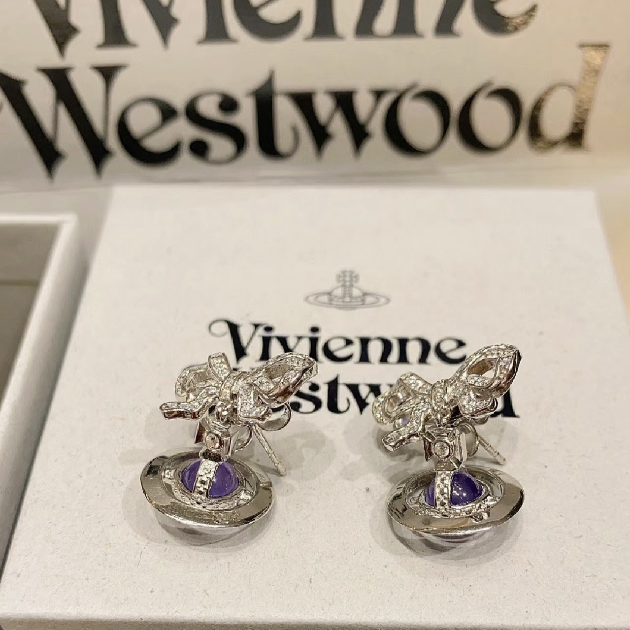 Vivienne Westwood Bowknot Crystal Saturn Earrings - Original Replica Club