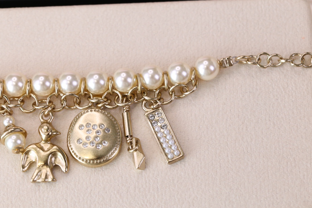 Chanel Bird CC Charms Chain Pearl Tassel Bracelet - Original Replica Club
