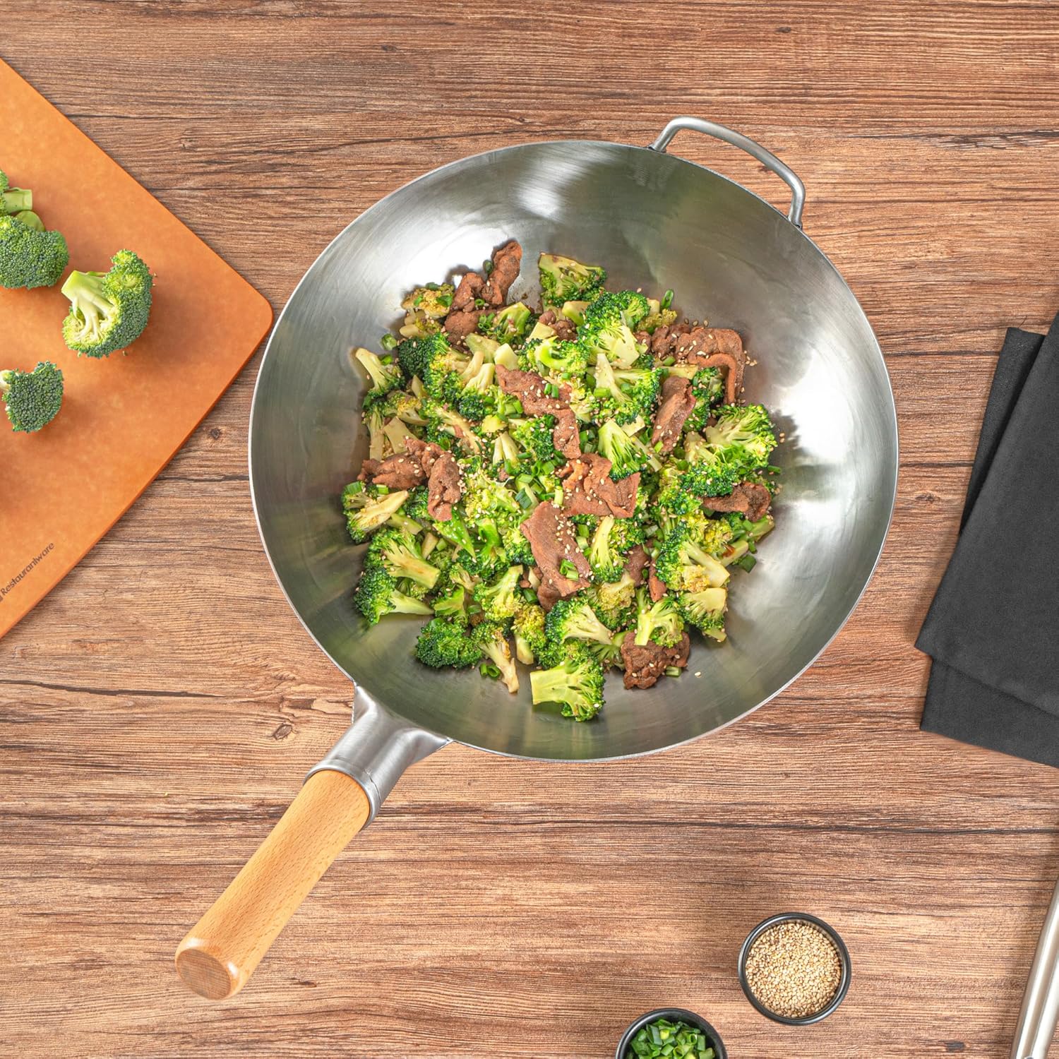 Restaurantware Carbon Steel Wok 1 Pack of 14 Inch Heavy-Duty Stir Fry Pan Silver Hand Hammered Wok Efficient Maneuvering Steel Helper Handle Uniform Heat Distribution Asian Cooking