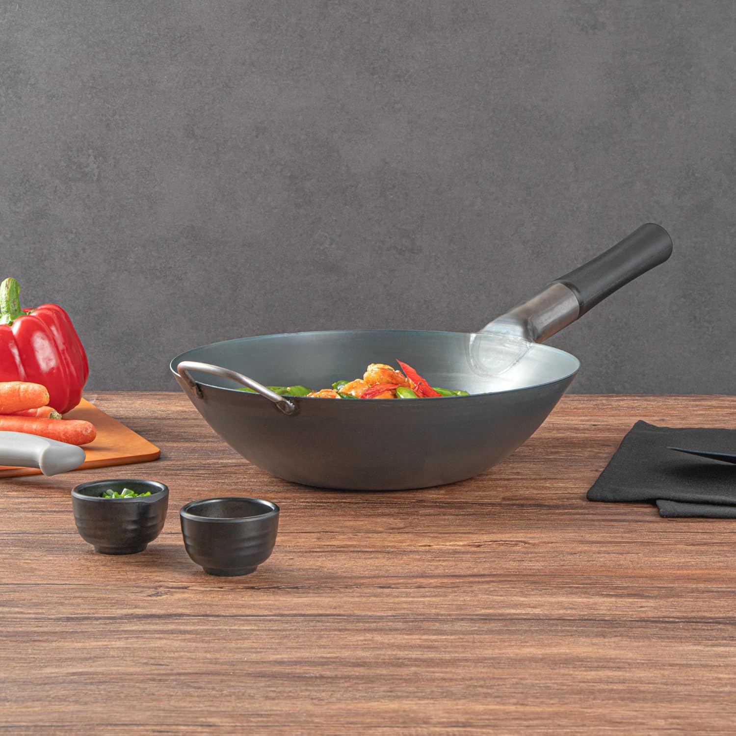 Restaurantware Carbon Steel Wok 1 Pack of 11.6 Inch Heavy-Duty Uniform Heat Distribution Pan Induction Compatible Flat Bottom Wok Welded Handle Black For Gas Stovetops And Grills
