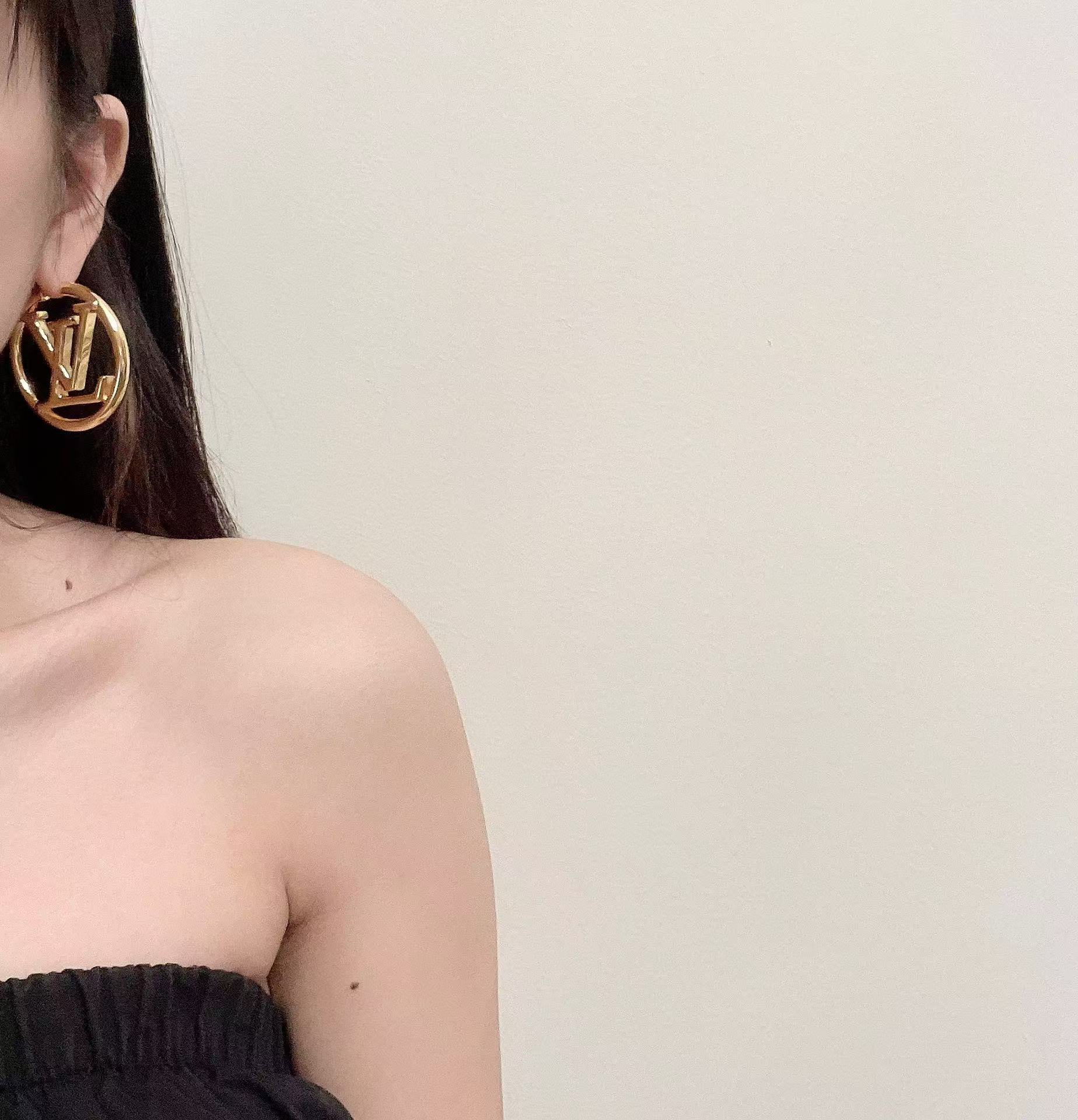 Louis Vuitton Large Hollow Round LV Letter Earrings - Original Replica Club