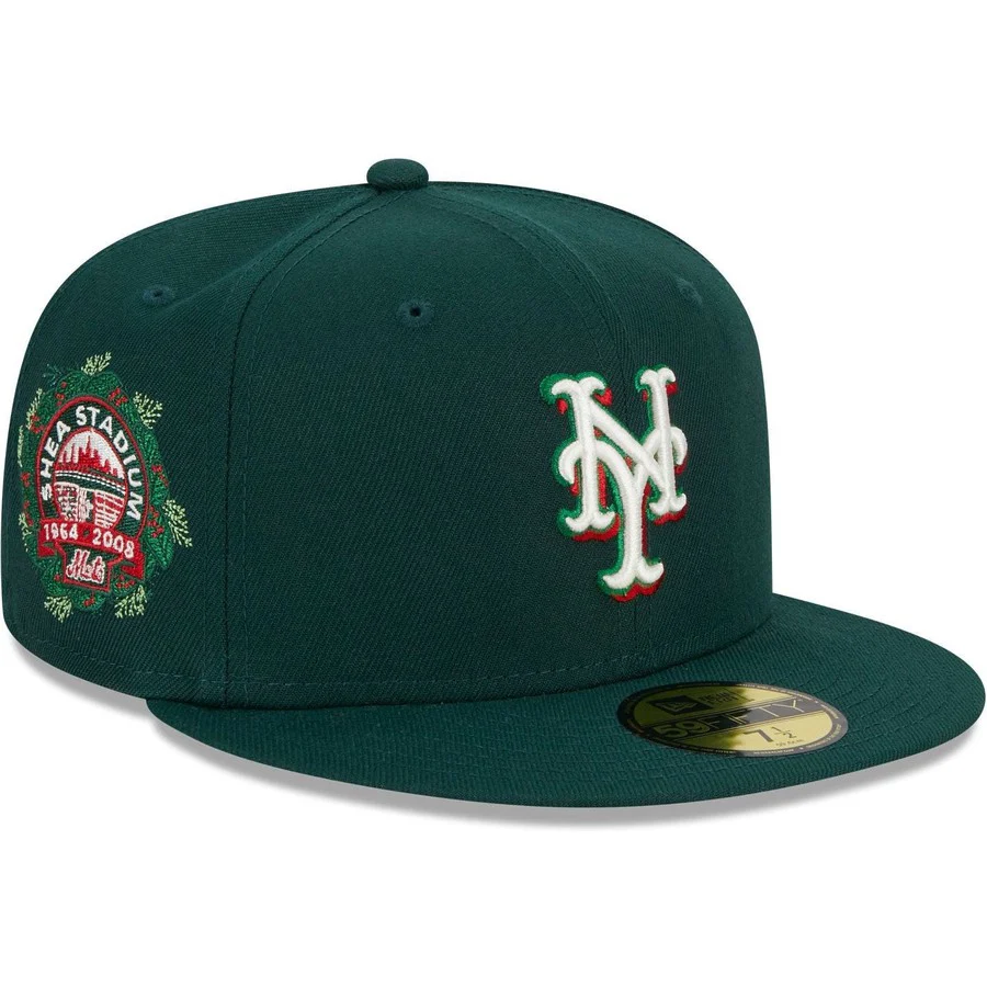 Angled view highlighting the embroidered Shea Stadium 1964-2008 wreath side patch on the New York Mets dark green fitted hat.