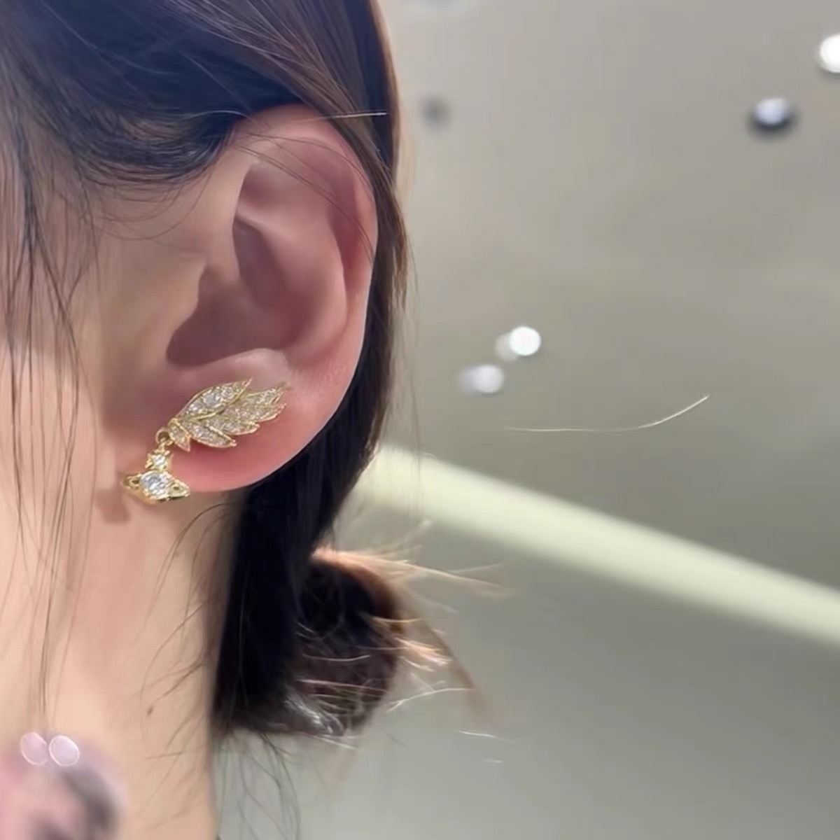 Vivienne Westwood Angel Wing Saturn Earrings - Original Replica Club